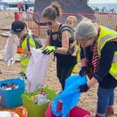 Volunteers helping at a previous Brighton beach clean event