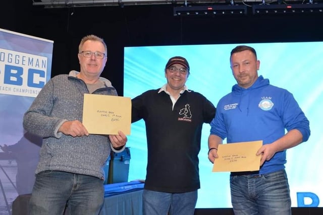 Pictured here are sea anglers Steve Kerr from Eastbourne and David Howell from Willingdon receiving prizes at European Open Beach Championship in Yorkshire. David took joint first place with longest flounder (28cm), and the pair came third in the pairs competition, having caught three cod between them. SUS-220429-132240001