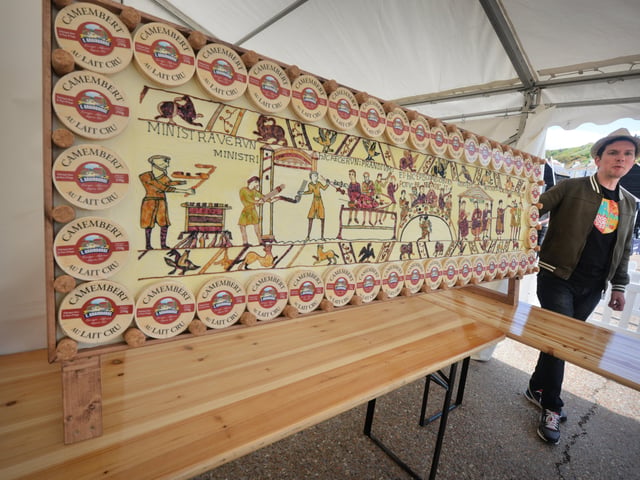 The Normandy Food Tour 2022 visits Hastings Old Town 29/4/22.
Bayeux Tapestry made out of butter and camembert. SUS-220429-131434001