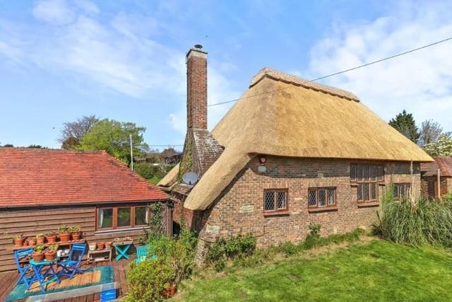 This delightful thatched cottage in Stunts Green, Herstmonceux, is on the market for a guide price of £795,000 to £825,000. SUS-220429-090945001