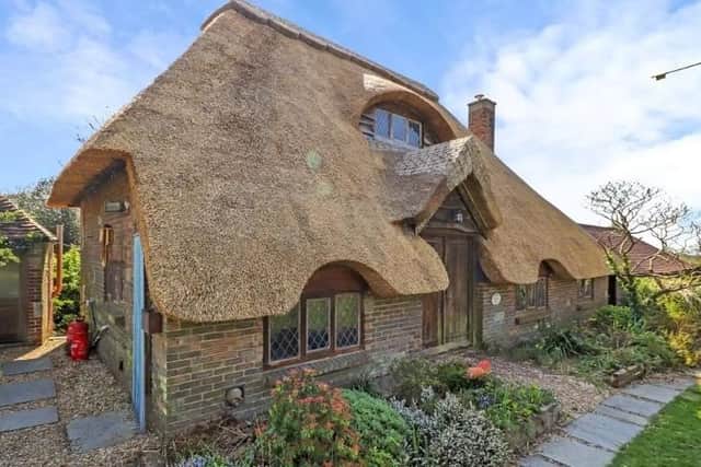 This delightful thatched cottage in Stunts Green, Herstmonceux, is on the market for a guide price of £795,000 to £825,000. SUS-220429-090835001