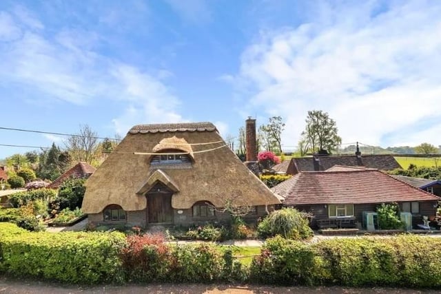 This delightful thatched cottage in Stunts Green, Herstmonceux, is on the market for a guide price of £795,000 to £825,000. SUS-220429-091155001