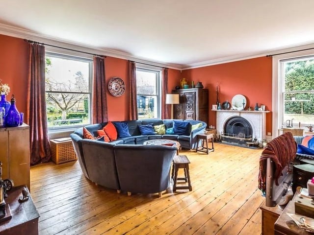 The drawing and reception rooms have high ceilings and marble fireplaces. Picture: Hamptons - Haywards Heath Sales.