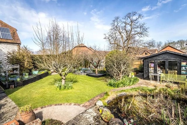 The property is surrounded by three sections of gardens. Picture: Hamptons - Haywards Heath Sales.