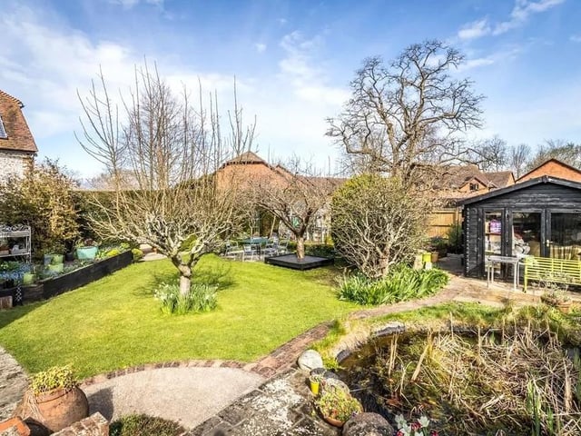The property is surrounded by three sections of gardens. Picture: Hamptons - Haywards Heath Sales.