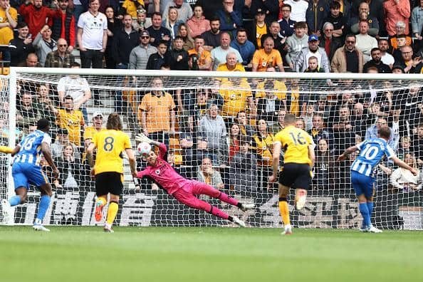 Brighton attacker Alexis Mac Allister scores from the penalty spot against Wolves in the Premier League at Molineux Stadium