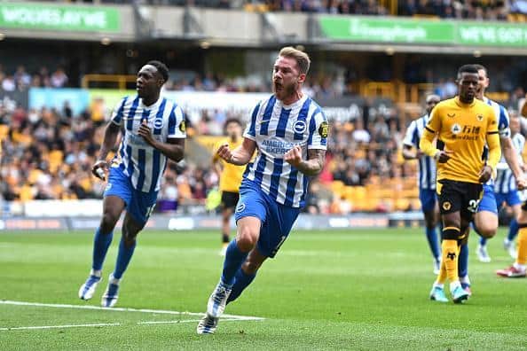 Brighton and Hove Albion midfielder Alexis Mac Allister celebrates his fifth goal of the season after scoring his second penalty at Wolves