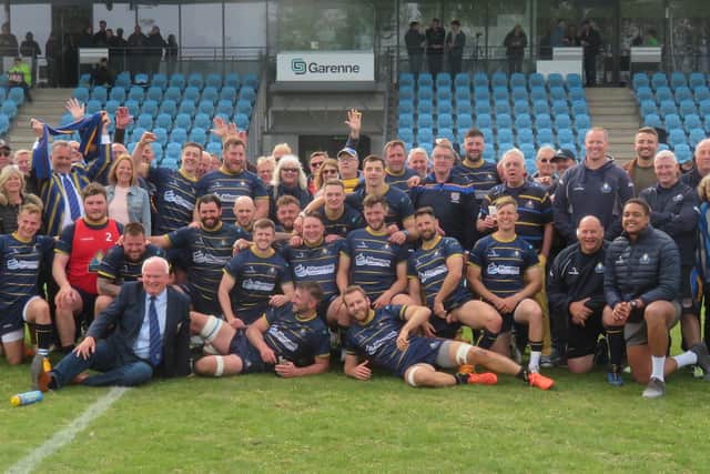 The Raiders squad celebrate the end of the National two south season