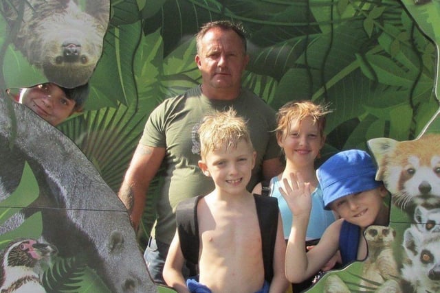 Jason Pulman (left) with his dad and siblings Kelsey, Tommy and Louis. SUS-220426-171022001