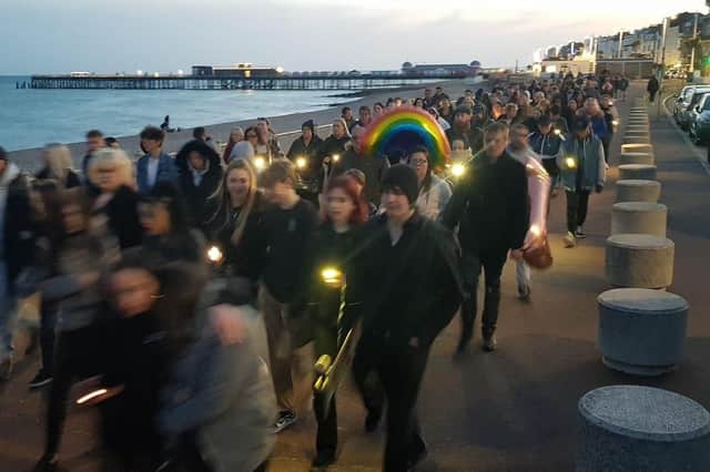 People pay their respects to Jason Pulman along Hastings seafront SUS-220305-100814001
