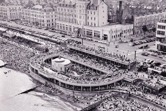 Aerial shot of the present-day Eastbourne Central Bandstand in the mid-1960s, showing the east wing of the Cavendish Hotel before the modern extension was added.  Picture sent in by Phil Gardner. SUS-220405-103552001