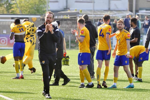 Players and staff celebrate survival and thank their loyal fans / Picture: Stephen Goodger