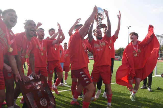 Worthing celebrate the title / Picture: Marcus Hoare