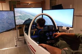 Cadets undertake pre-flight familiarisation on a glider training simulator at RAF Kenley. (Crown Copyright 2019)