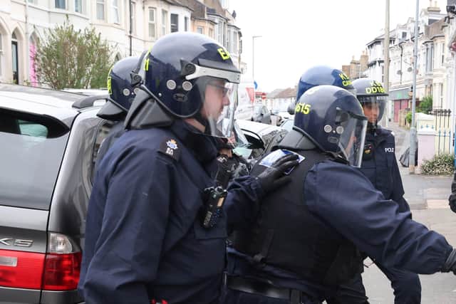 Police at a raid in East Sussex SUS-220505-155428001