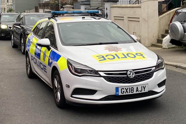 Police at a raid in East Sussex SUS-220505-155603001