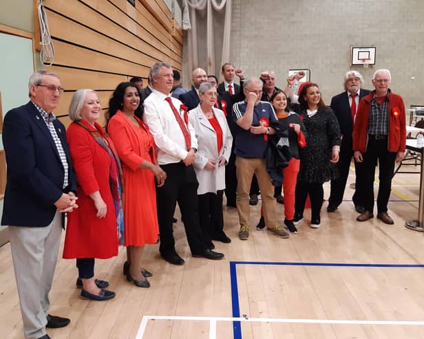 Labour members celebrate finishing on top in Crawley council election