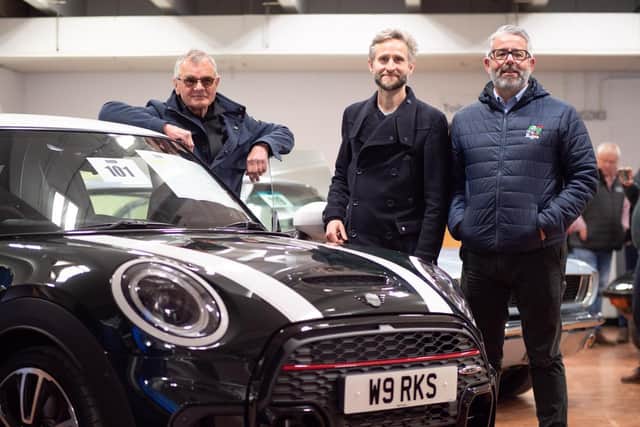 The Cooper family, including John Cooper himself, has supported The Italian Job's charity fundraising for more than 30 years.
