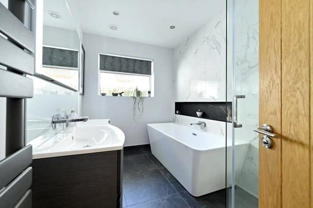 Each room has an elegant modern design and the bathroom has underfloor heating too. Picture: Mishon Mackay.