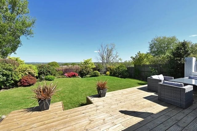 The rear garden boasts far reaching countryside views and has been extensively landscaped. Picture: Mishon Mackay.