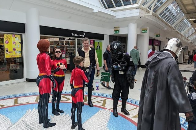 The Incredibles chat with Han Solo and a tie-fighter pilot outside Superdrug in Swan Walk