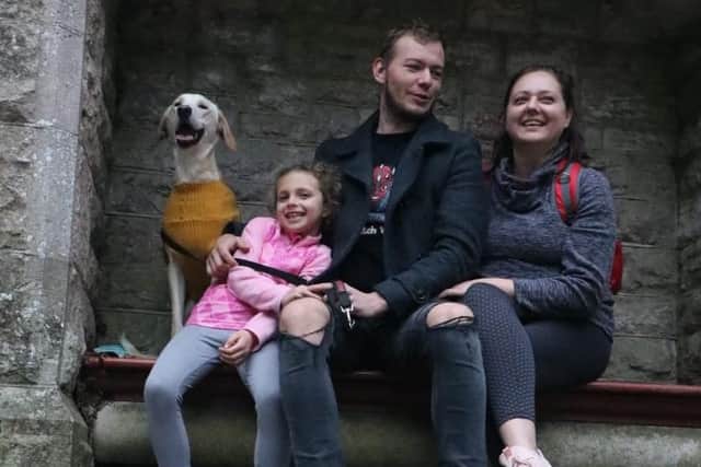 Briony Wescott with partner Tomass, daughter Olivia and Baxter the dog