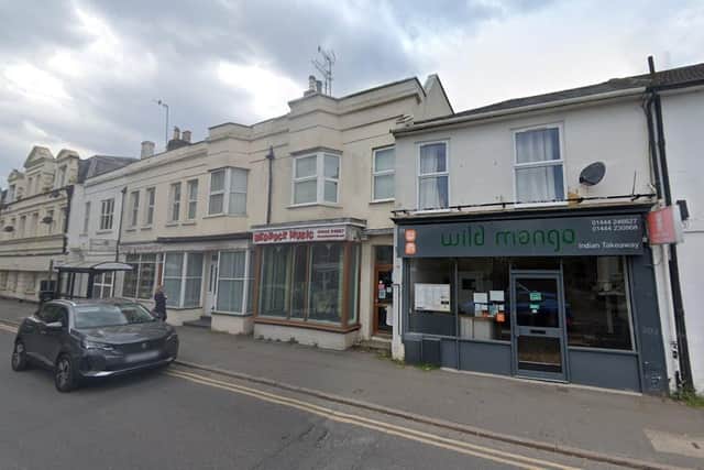 DM/22/1201: Bedrock Music, 21 Junction Road, Burgess Hill. Change of use from a Class E to a hot food takeaway (Sui Generis) along with the installation of extraction/ventilation equipment with associated alterations. Photo: Google Maps.