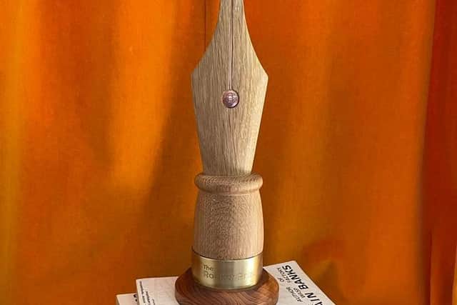 The winner received a pen-nib award especially made by local carver and engraver Neil Turner.