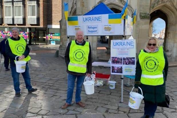Rotary club members collecting donations for Ukraine.