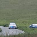 Police in Birling Gap Road. Picture from Laurence Baker SUS-221005-184625001