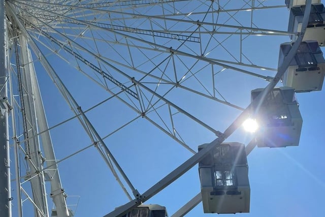 The sun shining through the Big Wheel on Eastbourne seafront, by Karen Bailey. SUS-221105-143814001
