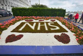 NHS floral tribute near to Carpet Gardens in Eastbourne SUS-210807-133634001