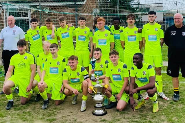 Hastings United Youth's under-18s with their silverware