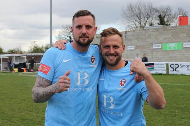 Kenny Pogue with Sam Adams after Hastings United won promotion / Picture: Scott White