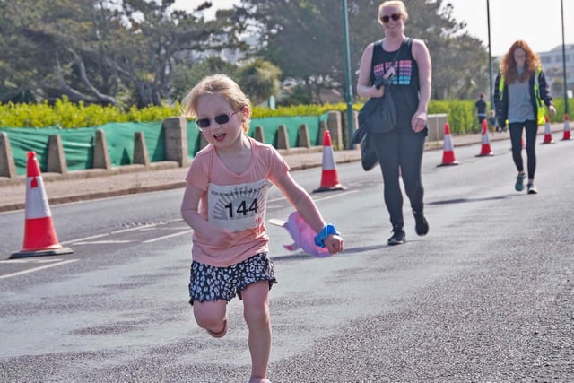 Action and winners from the Bognor Prom 10k and junior fun run, which made a triumphant return after two blank years in the pandemic / Picture: Steve Grove