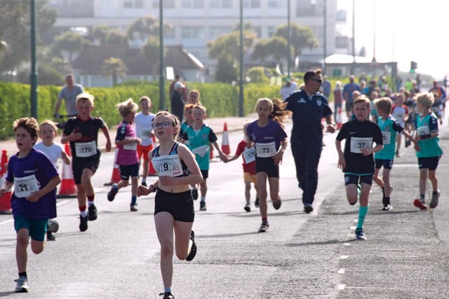 Action and winners from the Bognor Prom 10k and junior fun run, which made a triumphant return after two blank years in the pandemic / Picture: Steve Grove