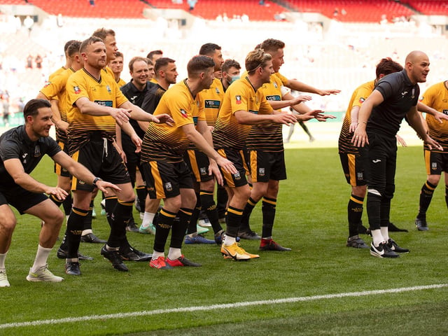 Littlehampton Town players in front of their fans after the game / Picture: Chris Hatton