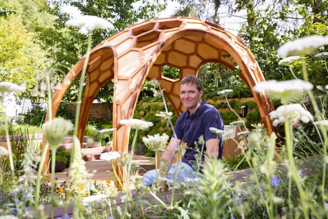 Hove-based landscape architect Joe Perkins in the Meta garden that has won Gold at this year’s show