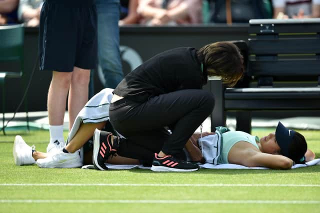Emma Raducanu receives treatment at Nottingham - her injury has been diagnosed as a side strain / Picture: Getty