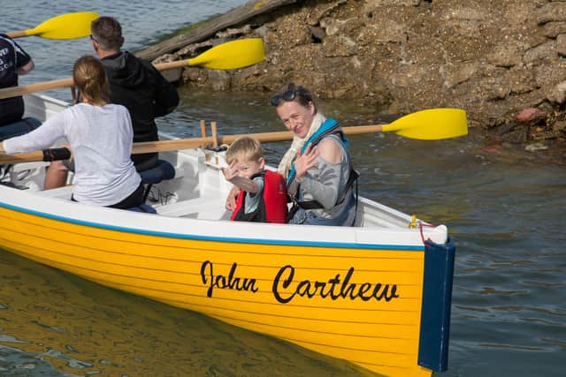 John Carthew's daughter in law Kelly Clifton and grandson Alfie test out the new boat
