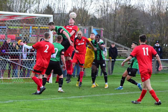 Action in the 2020 Ann John Trophy match between Hassocks and Burgess Hill / Picture: Chris Neal