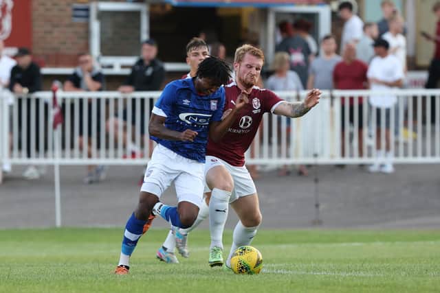 Finn O'Mara makes life difficult for an Ipswich player / Picture: Scott White