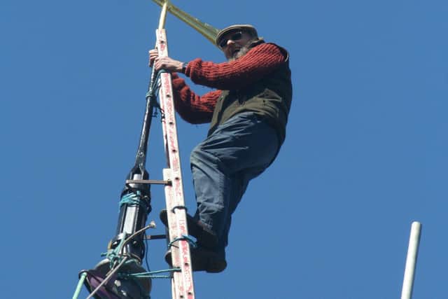 Peter Harknett, an 86-year-old steeplejack, completed his last job at St. Giles Church, Horsted Keynes. Picture: Friends of Horsted Keynes Church