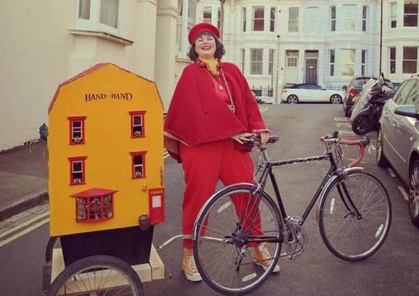 Jenny Left, the landlady of the Hand in Hand, with the mobile pub