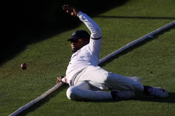 Delray Rawlins can't prevent a boundary at Old Trafford / Picture: Getty