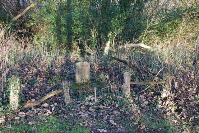 The grave dated 1837 had become overgrown and delapidated