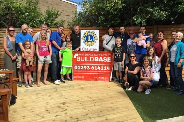 Abob members and community volunteers working together to complete Logan's Garden in Crawley
