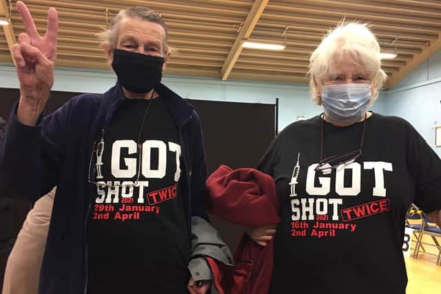 Michael and Synthia Grundy turned up together at Selsey Medical Centre on April 2, in 'I got shot twice' T-shirts designed by their daughter, Jacki