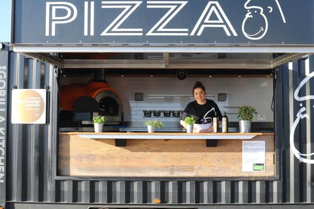 A wood-fired pizzeria is one of the pop-up traders