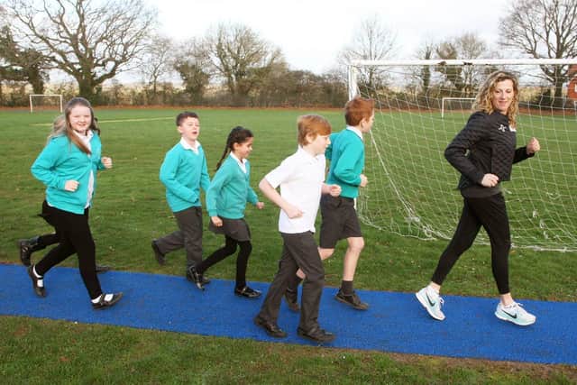 Sally Gunnell opening a new running track at Henfield Primary School. Photo by Derek Martin Photography